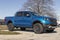 Ford Ranger pickup truck display at a dealership. The Ford Ranger nameplate has been used on multiple light duty trucks