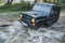 Fording a car through a river