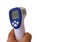 Forehead thermometer isolated  holding  in man `s hand