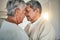 Forehead touch, love and senior couple in care, romantic spouse support or relax in retirement time together. Romance