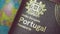 Foreign European Portuguese Schengen passport, against the background of a blue globe. The concept of international