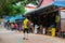 Foreign tourist strolling past Jeanett\'s Restaurant in Krabi, Th