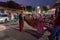 Foreigners buying Rajasthani womens clothes being sold at Famous Sardar Market and Ghanta ghar Clock tower in the evening