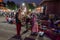 Foreigners buying Rajasthani womens clothes being sold at Famous Sardar Market and Ghanta ghar Clock tower in the evening