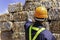 Foreman or engineer wearing protective clothing Currently ordering at a plastic recycling plant. Engineer and recycle. Engineers