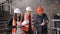 The foreman and two women inspectors visiting the construction site.