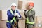 Foremen Loading Cardboard Boxes At Warehouse