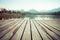 Forest Alpine mountain lake and wooden board