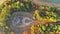 Forest in the autumn from a height a beautiful panorama of lake at landscape