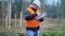 Forest engineer reading documents in the forest