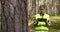 Forest evaluation, development and management - female forestry engineer or appraiser working with digital tablet in the woods