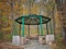 Forest gazebo captured surrounded by autumn foliage