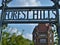 Forest Hills Sign with Dome Building Architecture Background