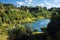 Forest lake in abandoned quarry