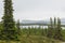 Forest and lakes and mountains during foggy weather