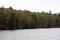 A forest meeting the rocky shoreline of Lake Superior in Bayfield, Wisconsin