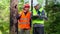 Forest Officer explains to young worker assigned work