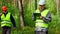 Forest Officer in forest with worker