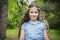 In the forest  an owl sits on the girlâ€™s shoulder