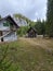 Forest path and abandoned houses  towards Ialomicioarei cave. Valea Horoabei, Romania mountains