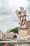 Forest after rain. Spruce branches in drops of dewStatue near the castle of the Holy Angel. View of the Vatican and St. Peter`s. R