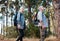 Forest, retirement and hiking, mature couple with backpack on nature walk and mountain path in USA. Travel, senior man