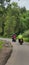 Forest road mountain cloud rainwaterfall bikes looking clouds beauty rider taking photo