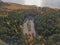 Forest and sea with parking for cars. Sunny day, Finland, Scandinavian nature. Autumn landscape, photo from above from a