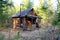 Forest shelter cabin for hunters in the Siberian taiga.