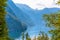 Forest window with view on lake near Schoenau am Koenigssee, Konigsee, Berchtesgaden National Park, Bavaria, Germany