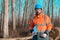 Forestry technician portrait during logging process in forest