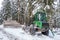 Forestry work in winter landscape