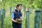 Forestry Worker With Clipboard Checking Young Trees