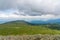 Forests and mountains of the Southern Urals near the village of Tyulyuk in Russia. Drone view.