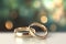 Forever United A Pair of Gold Wedding Rings with Bokeh Background. created with Generative AI