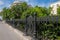 Forged fence with symbols in front of the building of Moscow State University