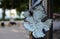 Forged wedge-shaped leaf on a lamppost close-up against.