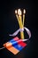 Forget-me-not- symbol of centennial of Armenian Genocide in Ottoman Empire- and flag of Armenia, burning candles. Day of Remembran