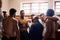 Forget sports team, theyre a family. a rugby coach addressing his team players in a locker room.