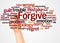 Forgive word cloud and hand with marker concept