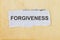 Forgiveness newspaper cutout