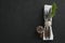 Fork, butter knife, fern and napkin with pine cone