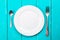 fork and spoon and empty plate