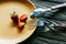 Fork and spoon on plate with strawberries