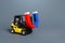 A forklift is carrying a big magnet. The concept of attraction and gravity. Attracting money and investments for startups