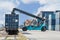 Forklift handling container box loading to freight train