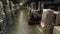 Forklift loader drives along workshop with paper at plant