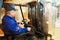 Forklift loader worker at warehouse