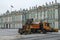 A forklift loads the removed snow into a truck at the Winter Palace