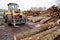 Forklift With Logs in Lumber Area